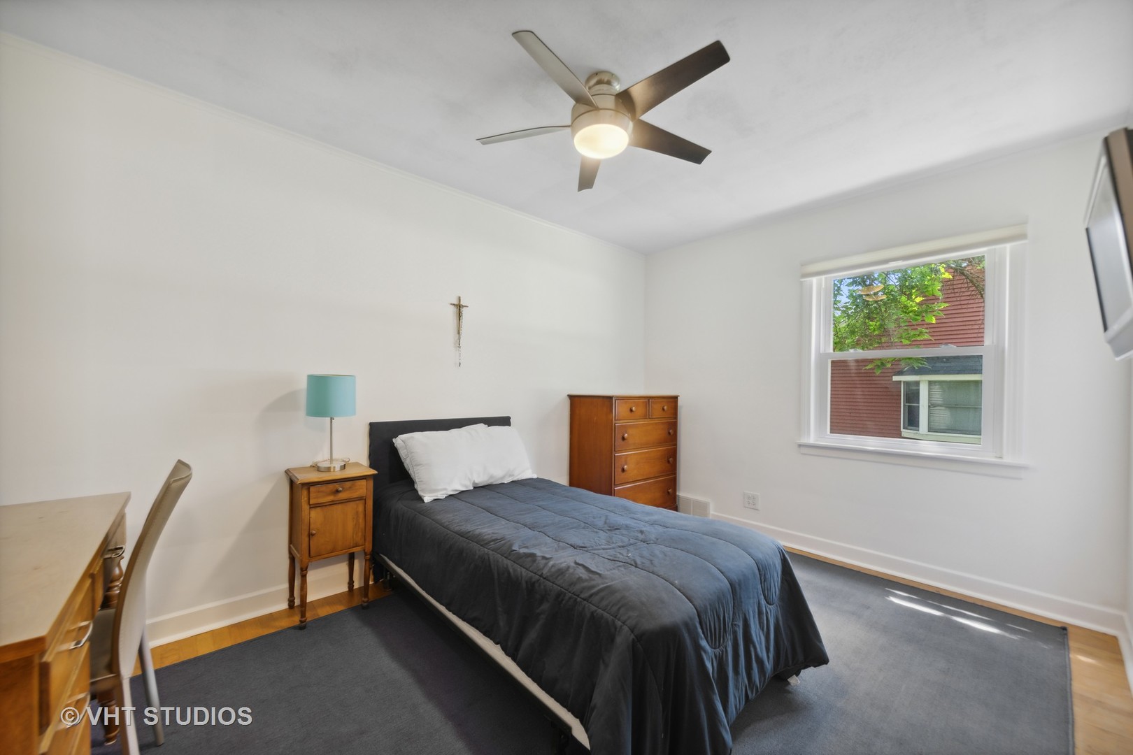 831 Warrenville Road Wheaton, IL 60189 - Photo 13 of 26 a bed room with a bed and a chair