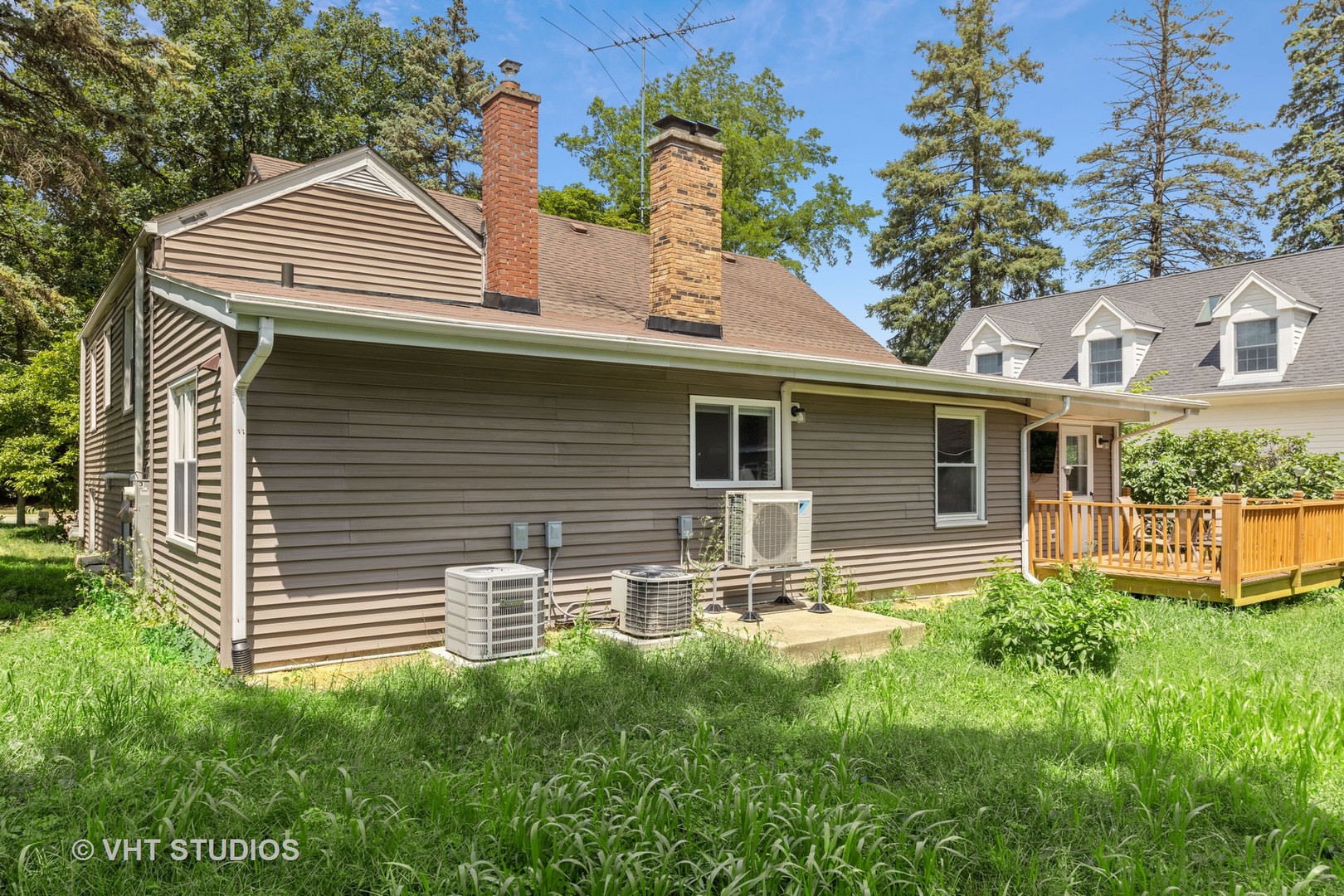 831 Warrenville Road Wheaton, IL 60189 - Photo 23 of 26 a view of a house with back yard