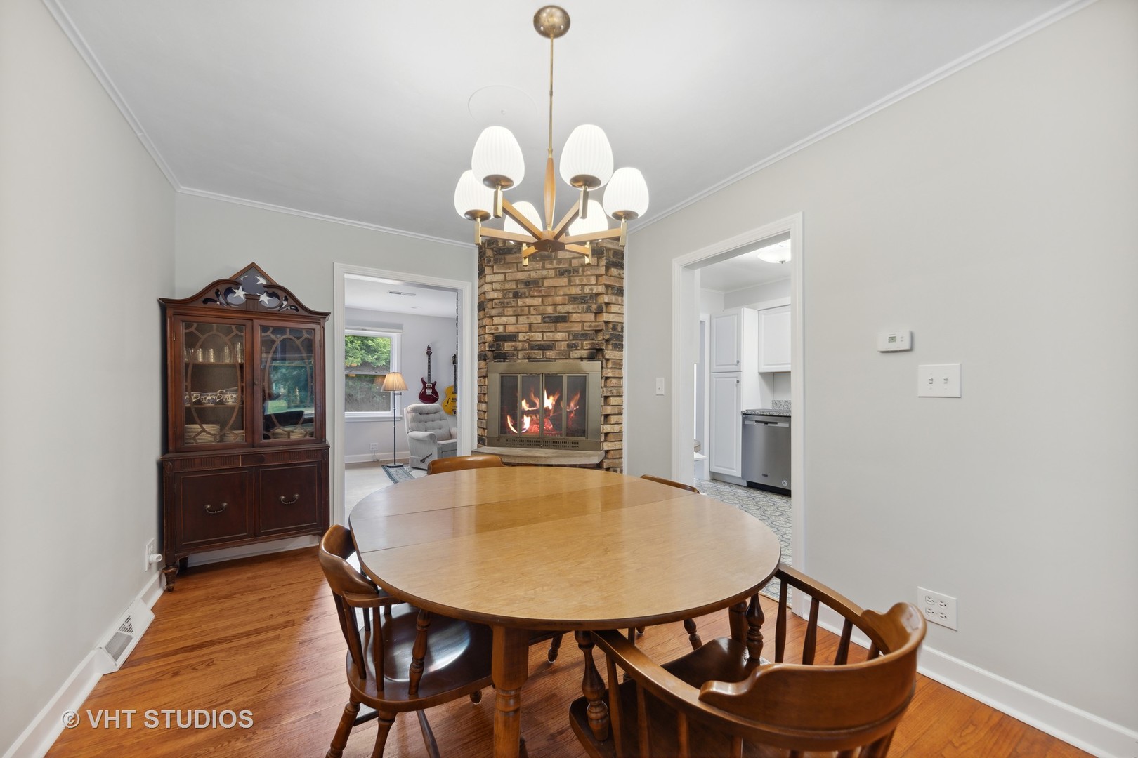 831 Warrenville Road Wheaton, IL 60189 - Photo 4 of 26 a dining room with furniture and window