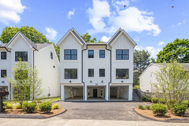 front view of a house with a yard