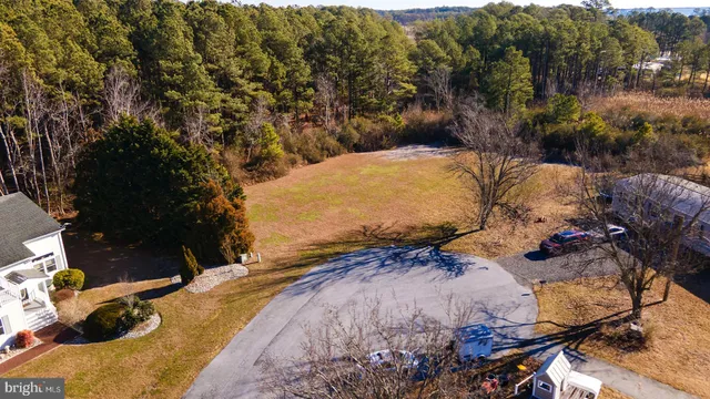 a view of a backyard of the house