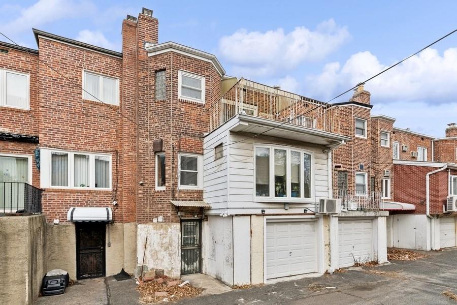 108-28 65th Road Queens, NY 11375 - Photo 15 of 15 a view of a house with a balcony