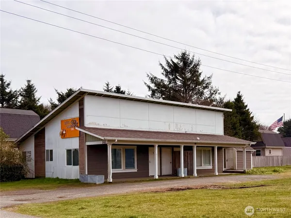 a front view of a house with a swimming pool