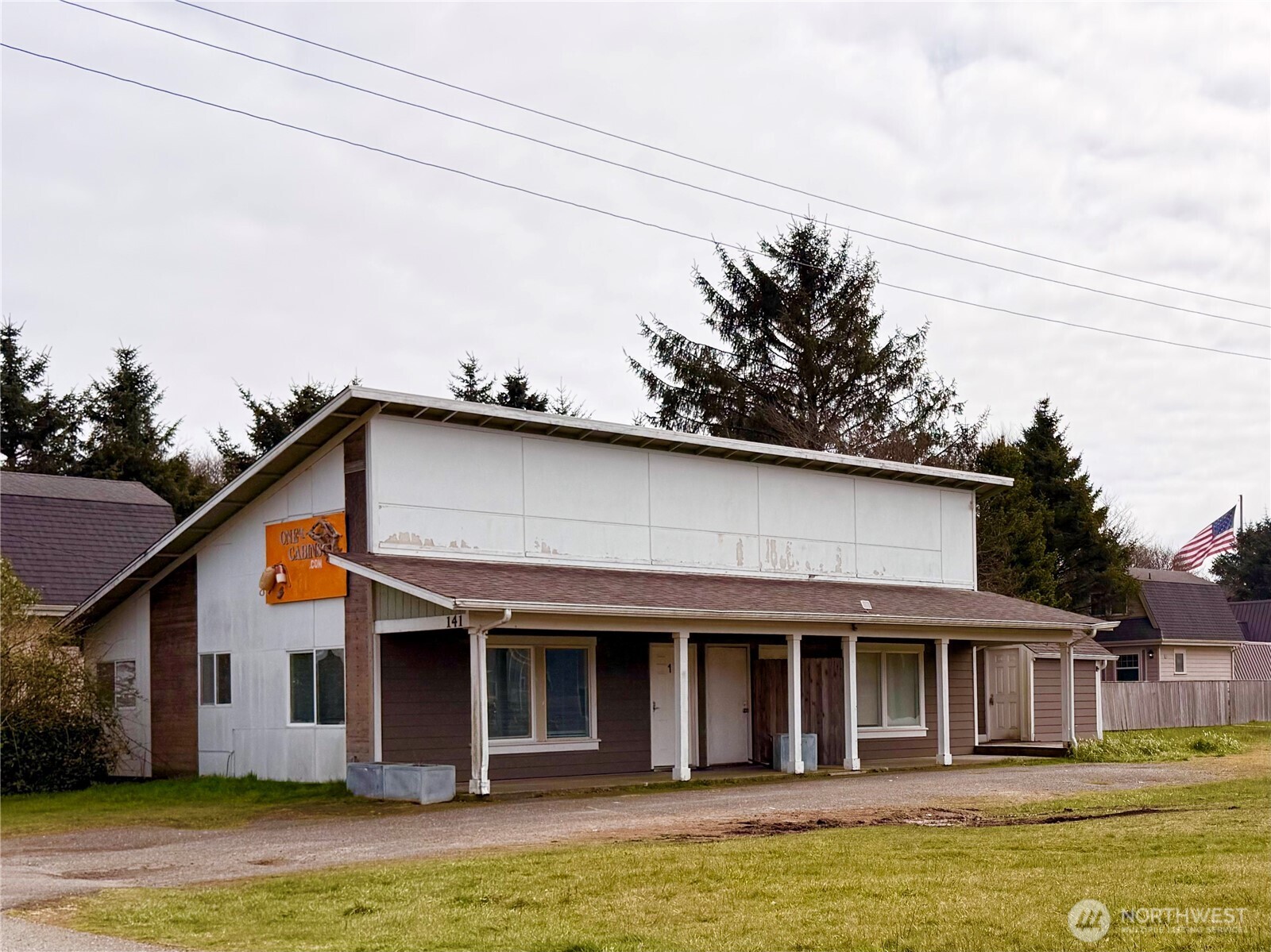 a front view of a house with a swimming pool