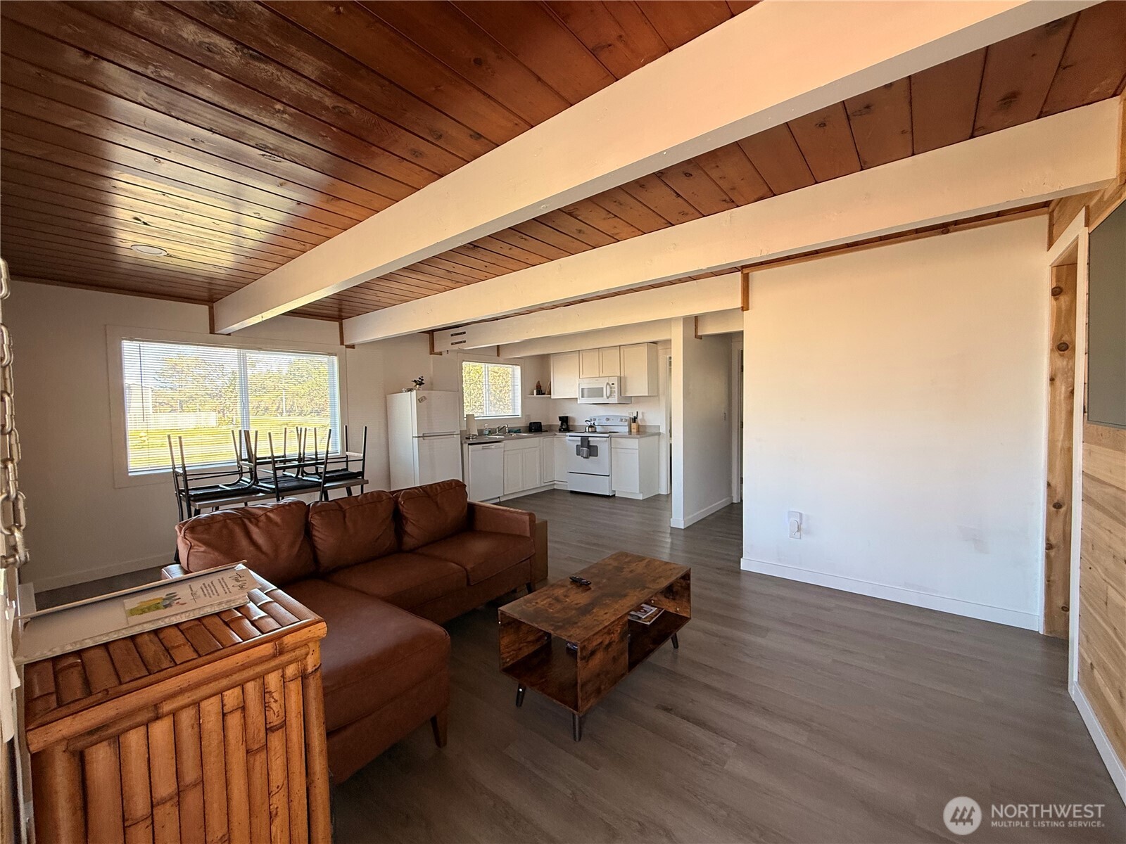 141 Barnacle Street Ocean Shores, WA 98569 - Photo 14 of 27 a living room with furniture and a wooden floor
