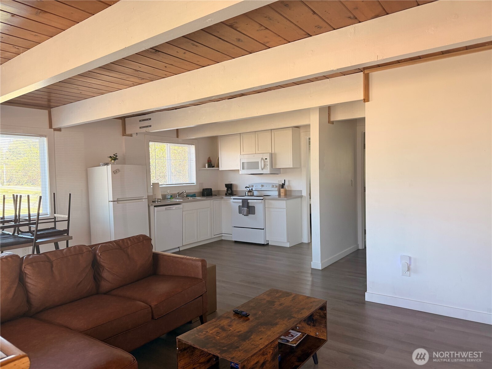 141 Barnacle Street Ocean Shores, WA 98569 - Photo 2 of 27 a living room with furniture and kitchen view