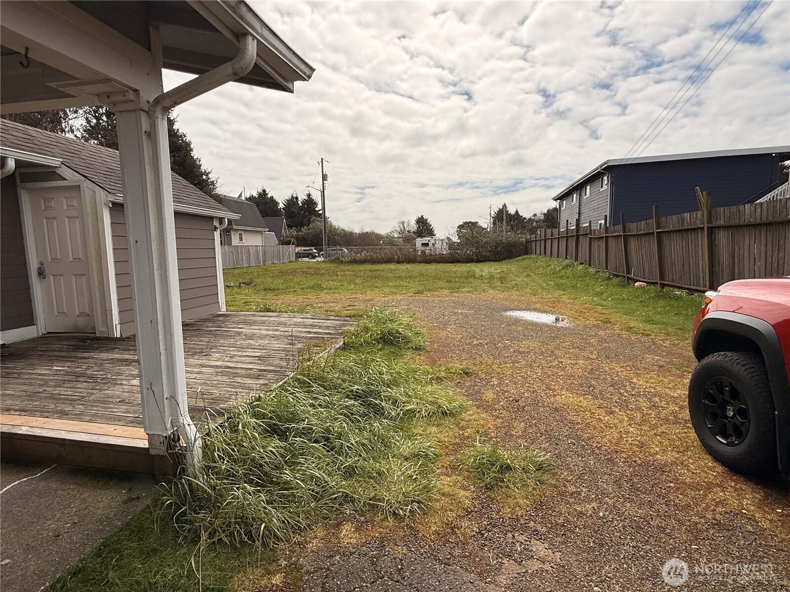 141 Barnacle Street Ocean Shores, WA 98569 - Photo 24 of 27 a view of a house with a yard