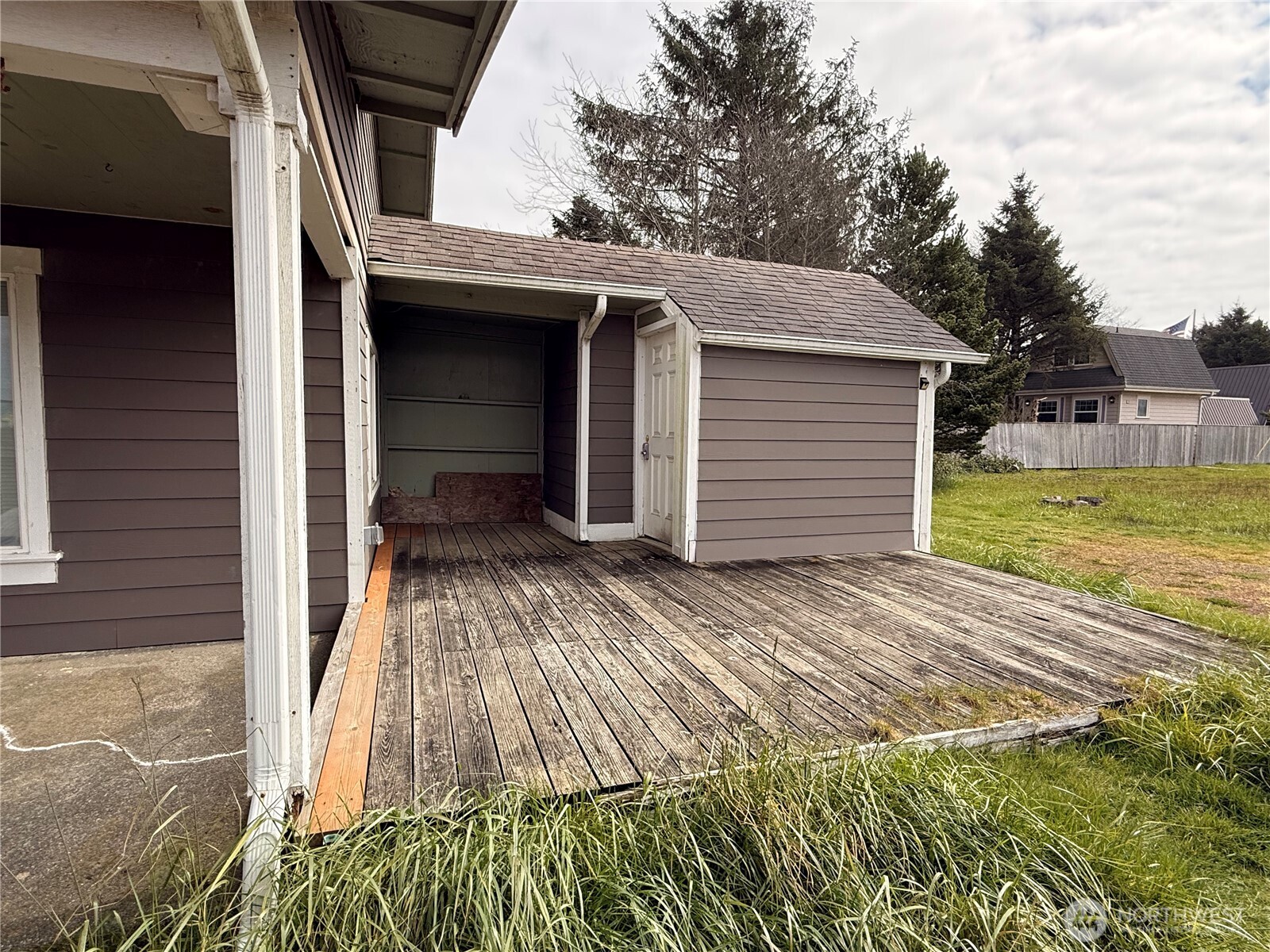 141 Barnacle Street Ocean Shores, WA 98569 - Photo 25 of 27 a view of a backyard of the house