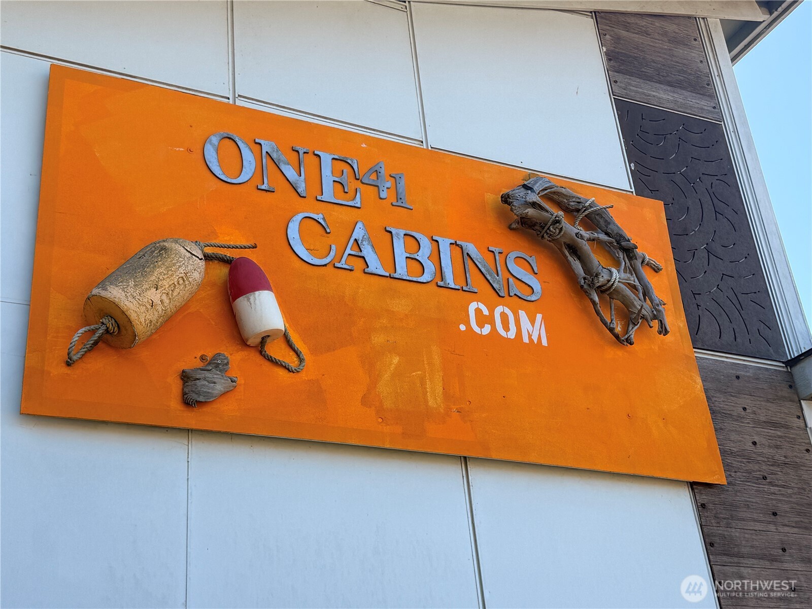 141 Barnacle Street Ocean Shores, WA 98569 - Photo 5 of 27 a close up of a street sign