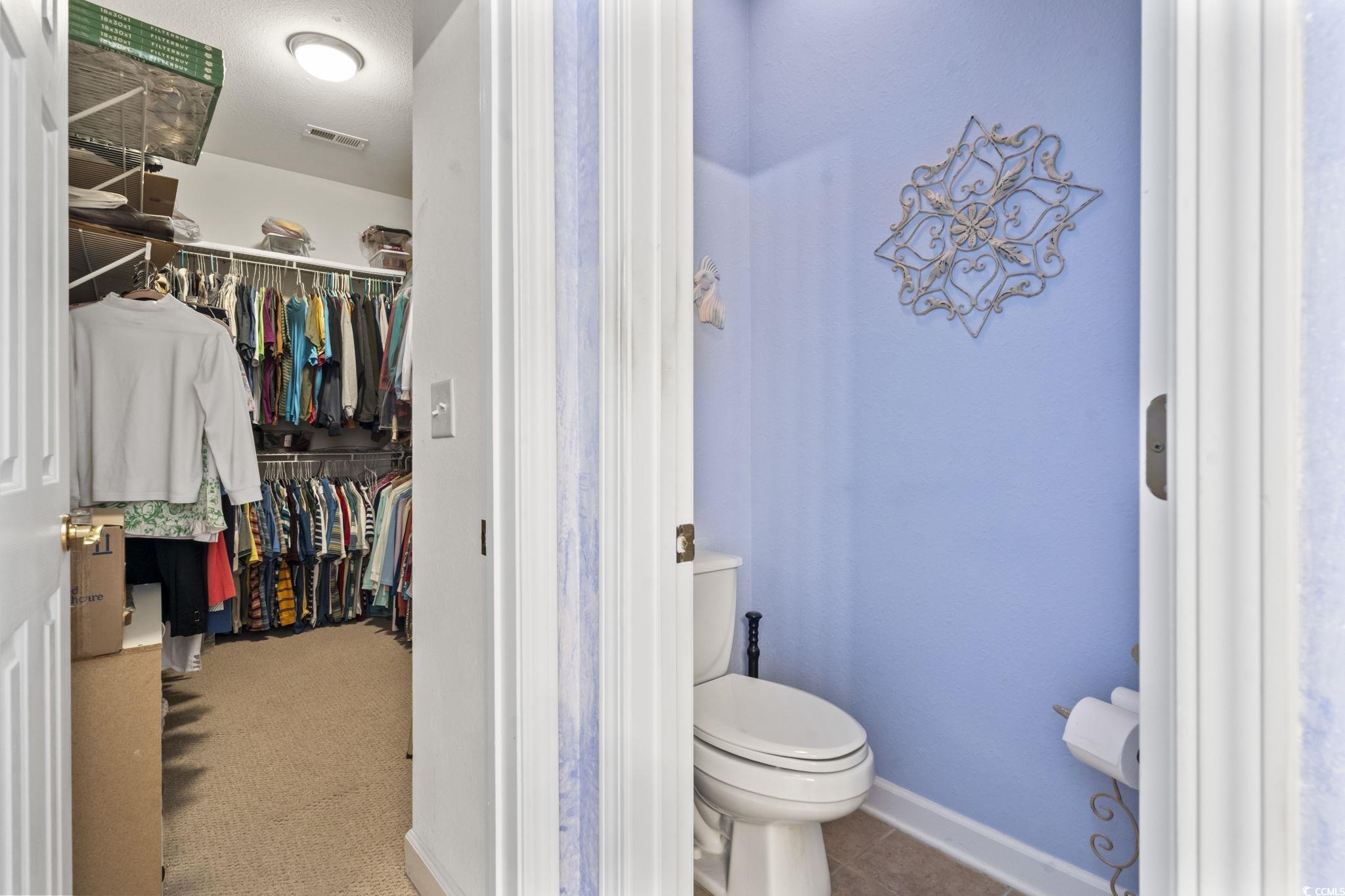 2356 Seneca Ridge Drive Myrtle Beach, SC 29579 - Photo 20 of 39 Bathroom featuring toilet and a spacious closet