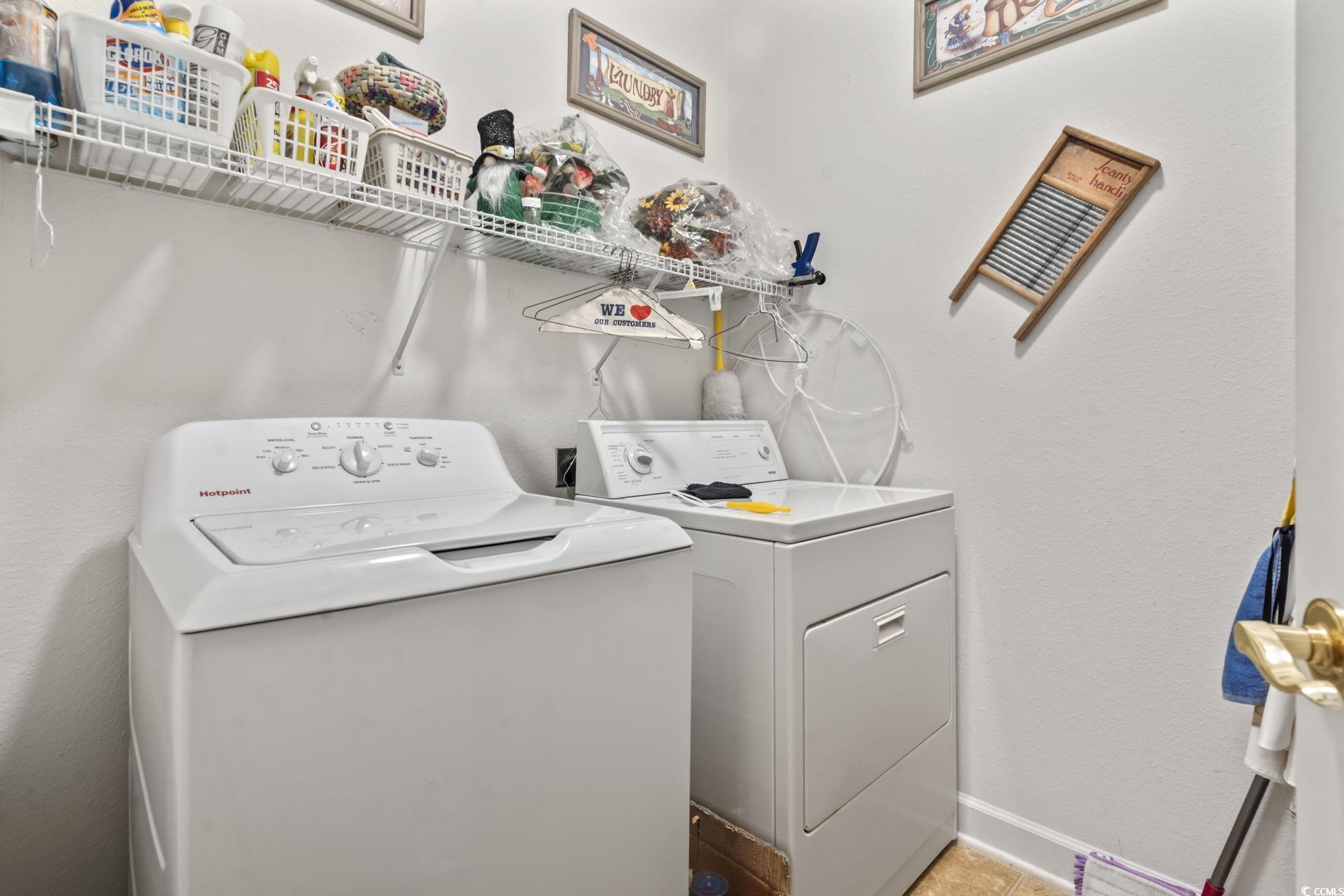 2356 Seneca Ridge Drive Myrtle Beach, SC 29579 - Photo 21 of 39 Laundry area featuring a textured wall and separate washer and dryer