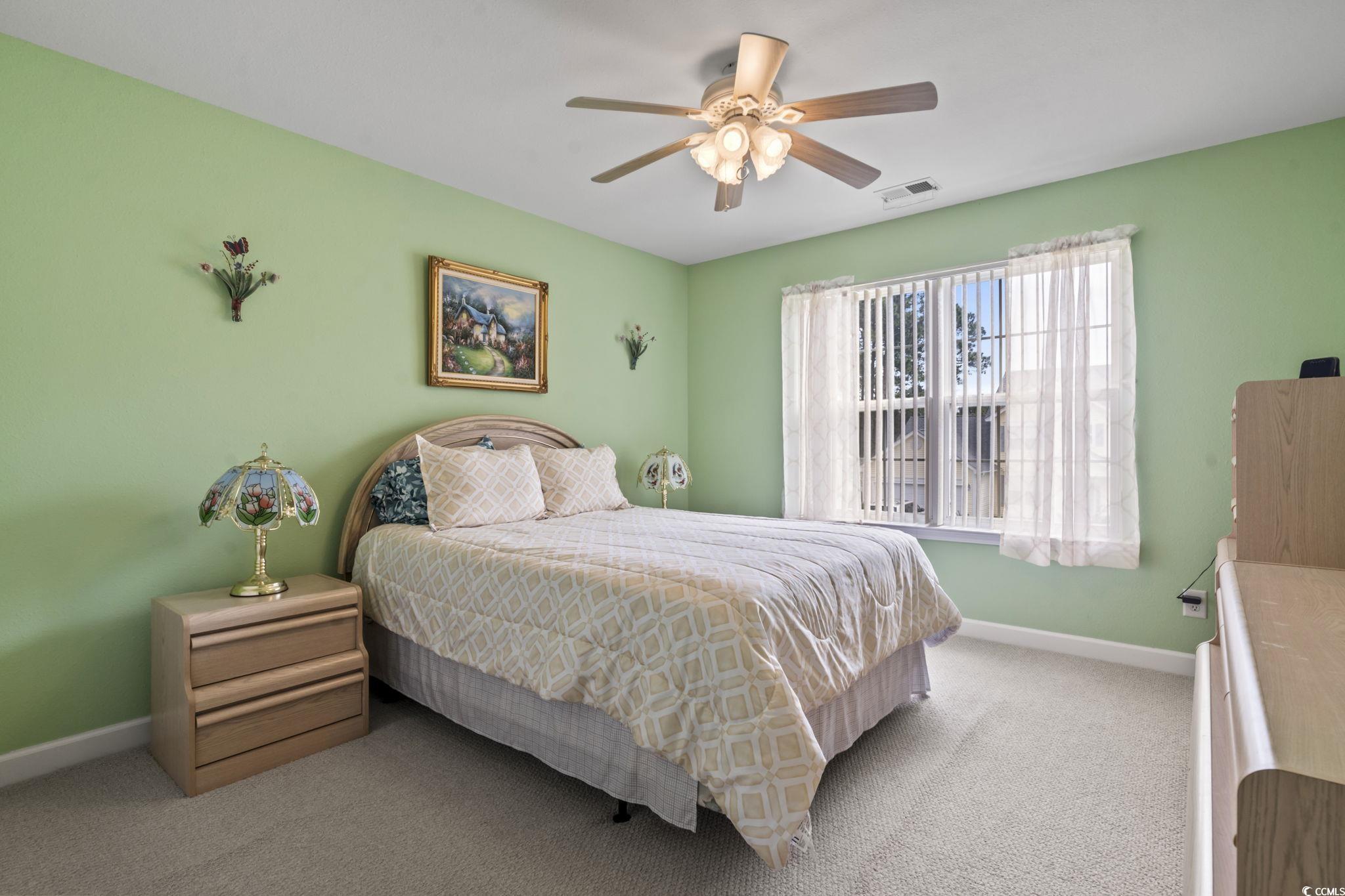 2356 Seneca Ridge Drive Myrtle Beach, SC 29579 - Photo 25 of 39 Bedroom featuring carpet flooring and a ceiling fan