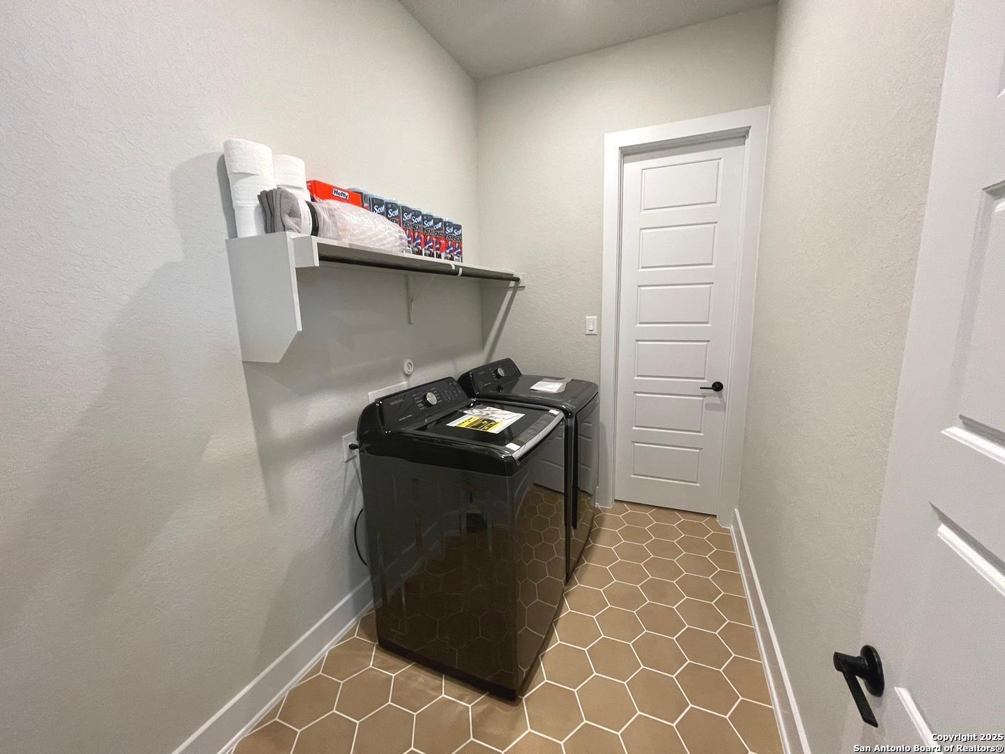 20675 Huebner Road, Unit 525 San Antonio, TX 78258 - Photo 10 of 19 a close view of utility room