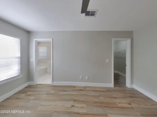 an empty room with a natural light