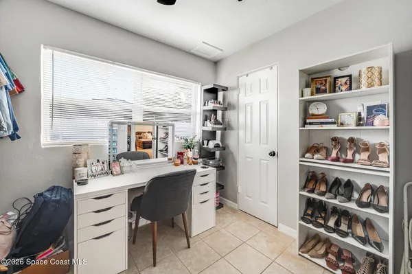 a kitchen with a sink a stove and a refrigerator