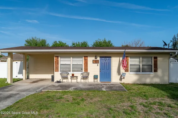 front view of house with a yard
