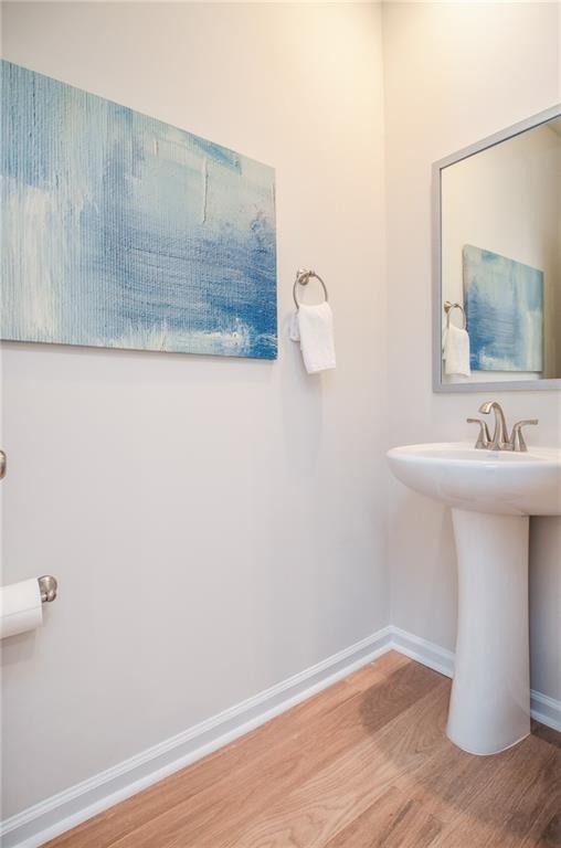 4551 High Rdg Court Sugar Hill, GA 30518 - Photo 11 of 40 a bathroom with a sink and a mirror