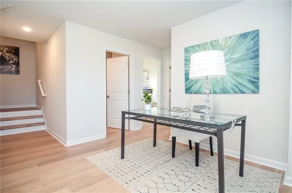 a view of a livingroom with furniture