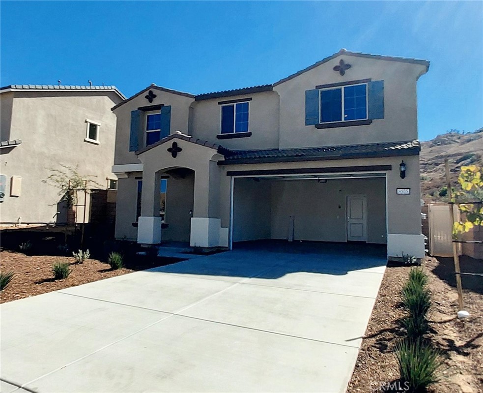 8525 Anthony Street Colton, CA 92324 - Photo 1 of 1 a front view of a house with a yard