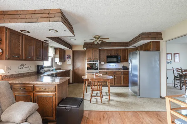 a view of a swimming pool with a yard