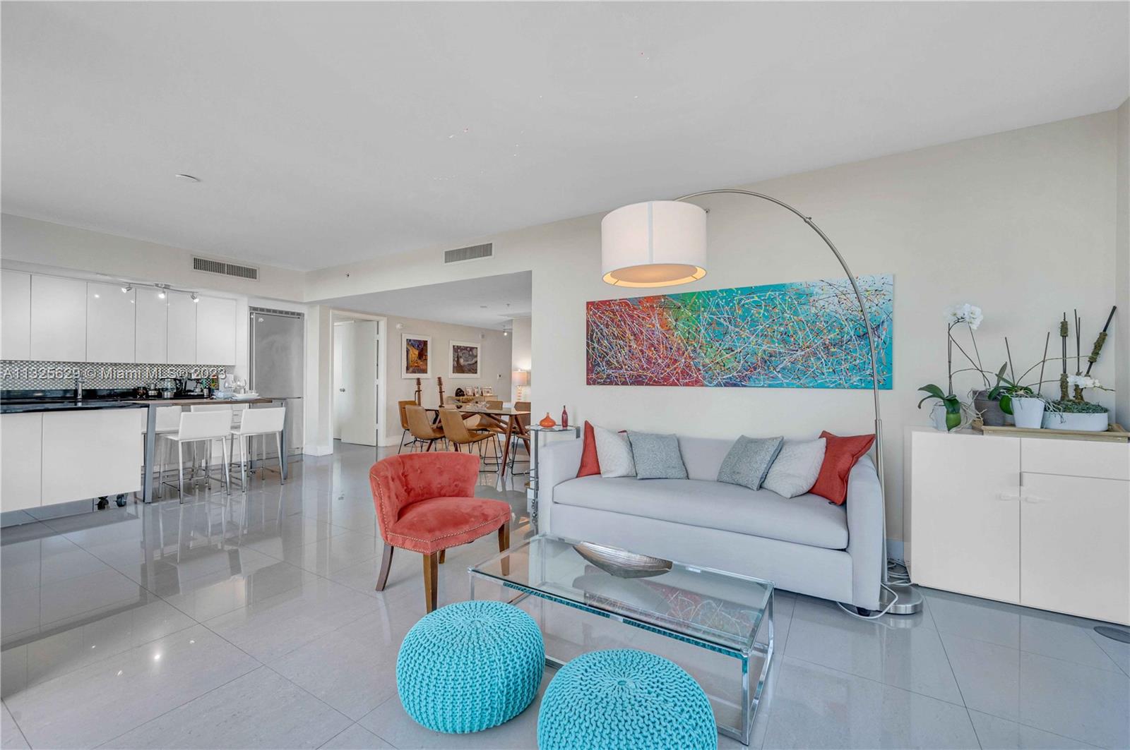 92 Southwest 3rd Street, Unit 1605 Miami, FL 33130 - Photo 7 of 37 a living room with furniture and a rug