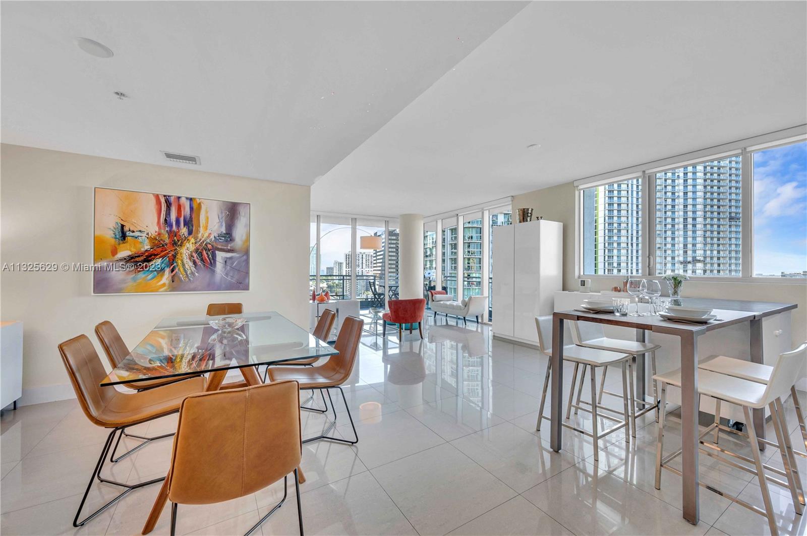 92 Southwest 3rd Street, Unit 1605 Miami, FL 33130 - Photo 9 of 37 a view of a livingroom and dining room