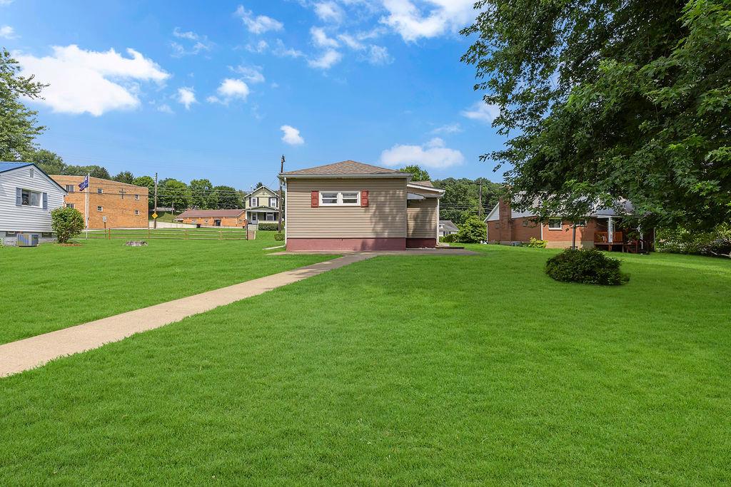 4706 Rochester Road New Brighton, PA 15066 - Photo 27 of 28 Beautiful level yard with sidewalk to back patio.