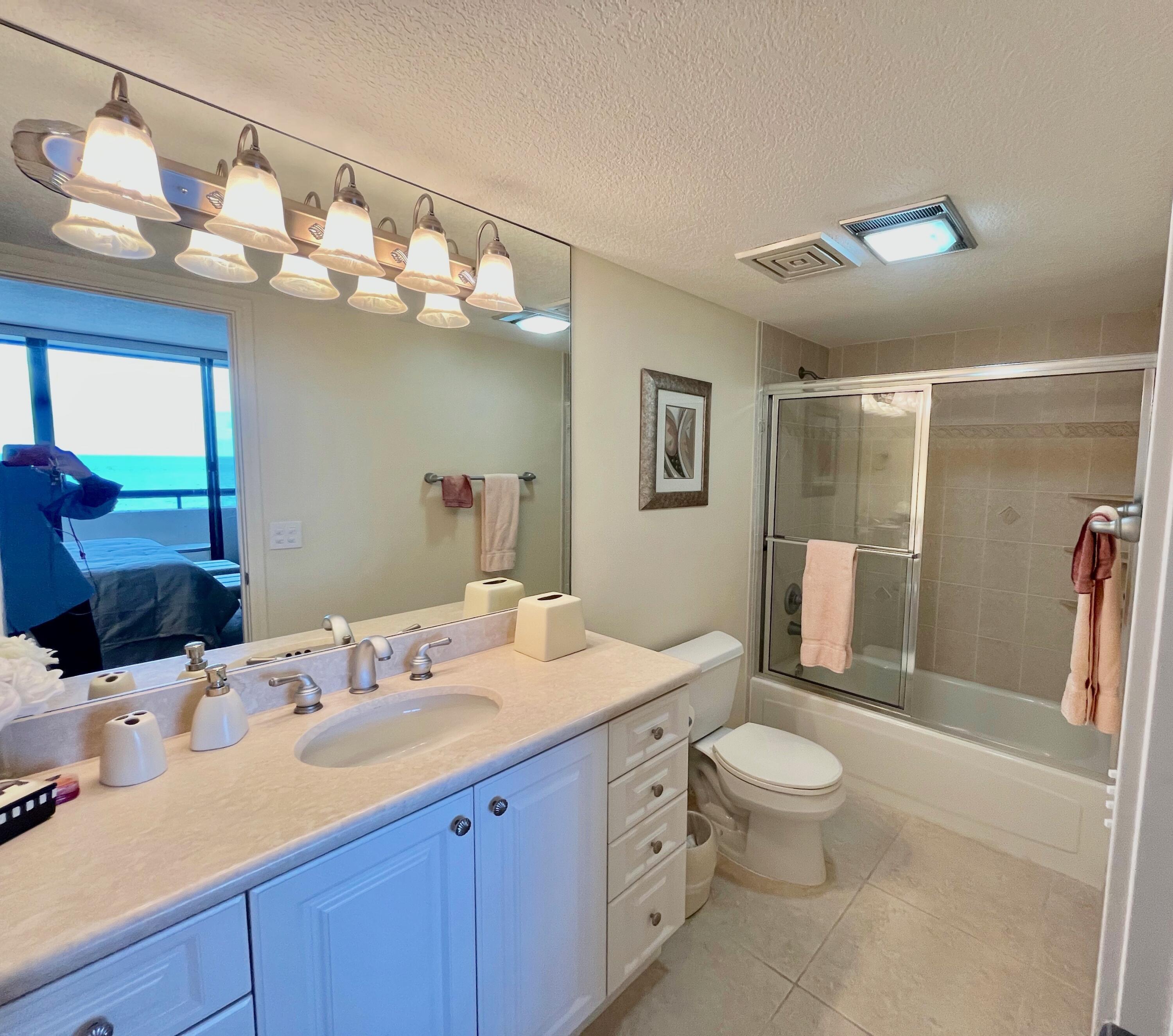 4000 North Ocean Drive, Unit 902 Singer Island, FL 33404 - Photo 25 of 52 HIS BATHROOM