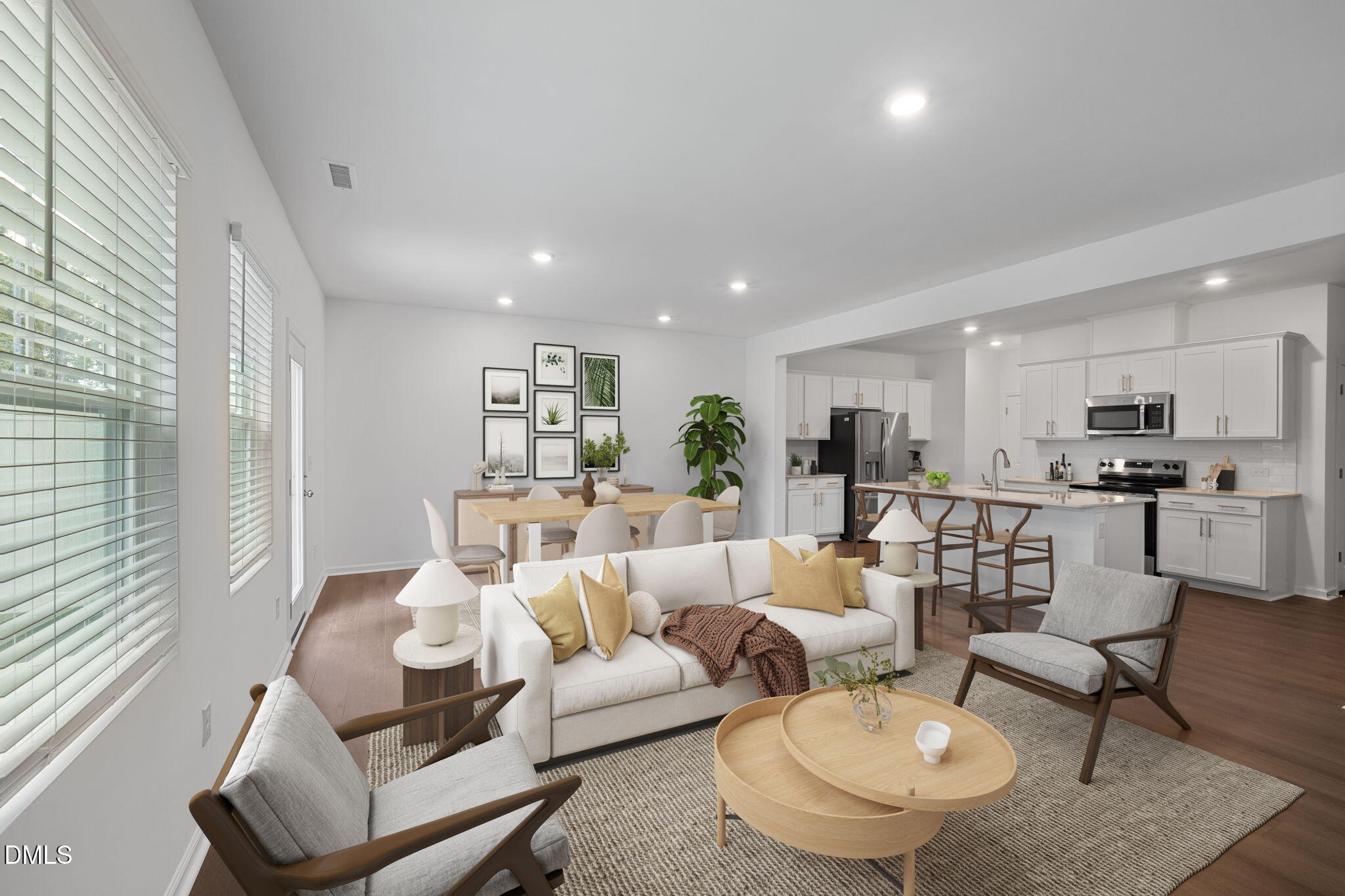 421 Deep Oak Drive, Unit SAWYER Rolesville, NC 27571 - Photo 4 of 16 a living room with furniture and a view of kitchen