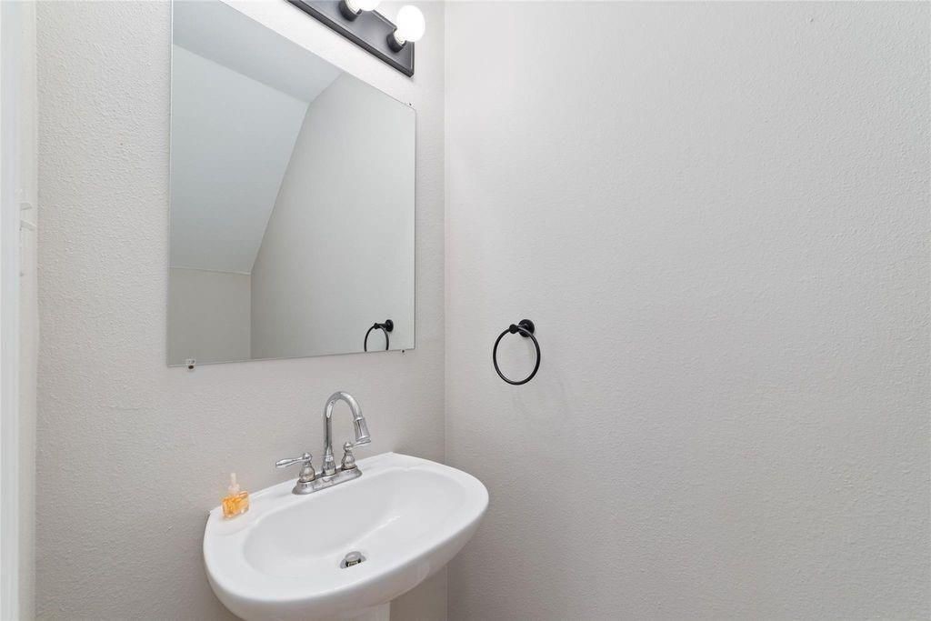 4007 Starbridge Pointe Lane Katy, TX 77449 - Photo 12 of 30 a bathroom with a sink and mirror