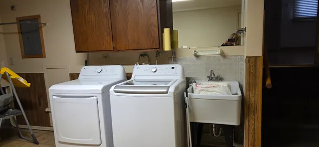 a utility room with dryer and washer