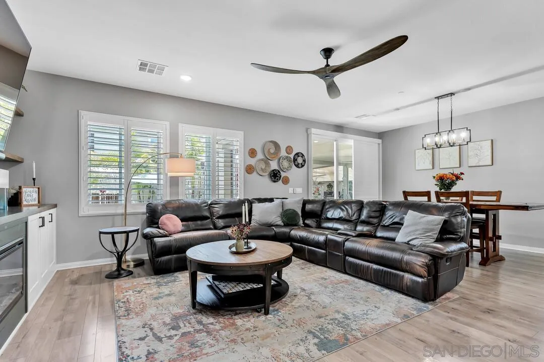 10700 Spring Creek Drive Santee, CA 92071 - Photo 23 of 74 a living room with furniture and a large window