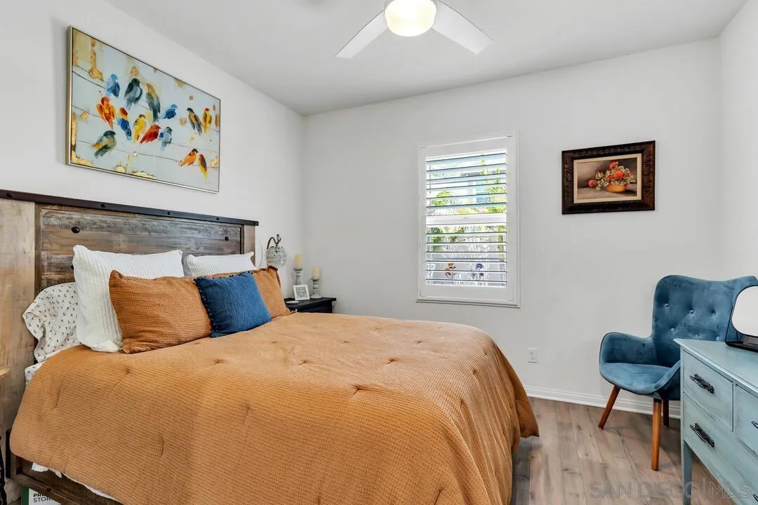 10700 Spring Creek Drive Santee, CA 92071 - Photo 28 of 74 a bed sitting in a bedroom next to a window