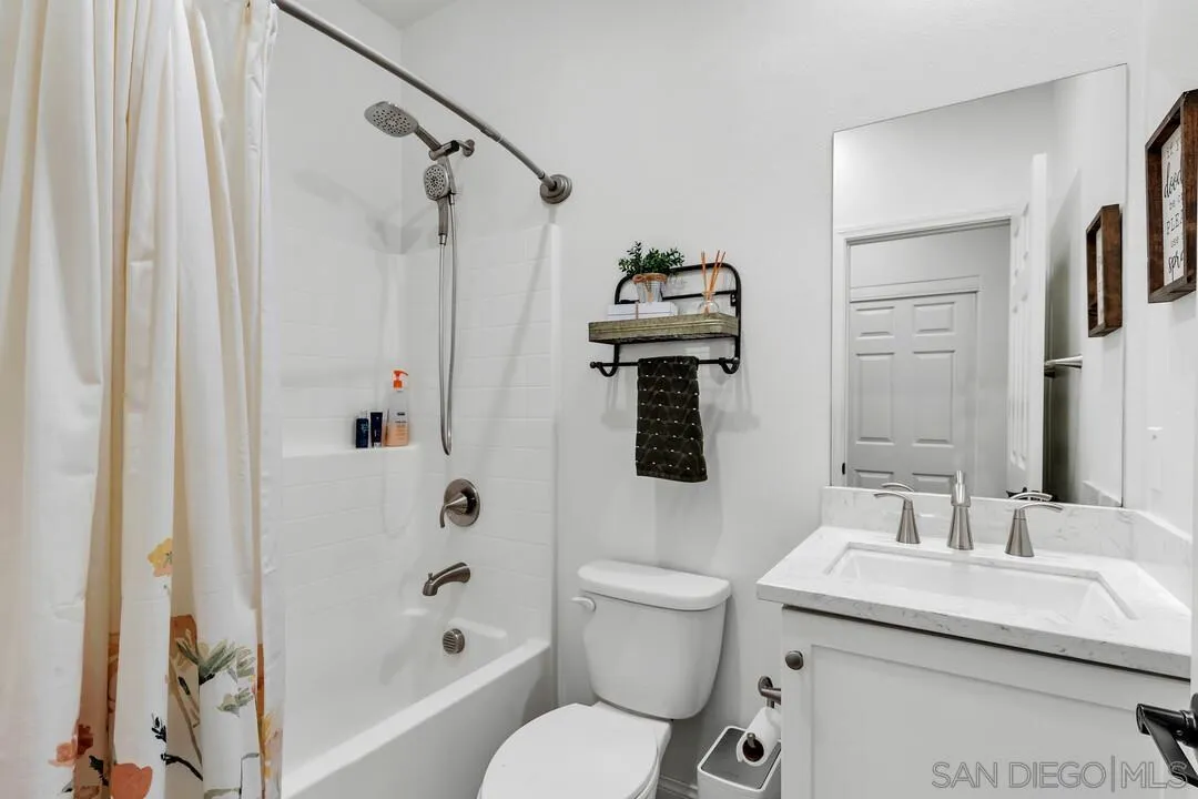 10700 Spring Creek Drive Santee, CA 92071 - Photo 32 of 74 a bathroom with a sink toilet and shower