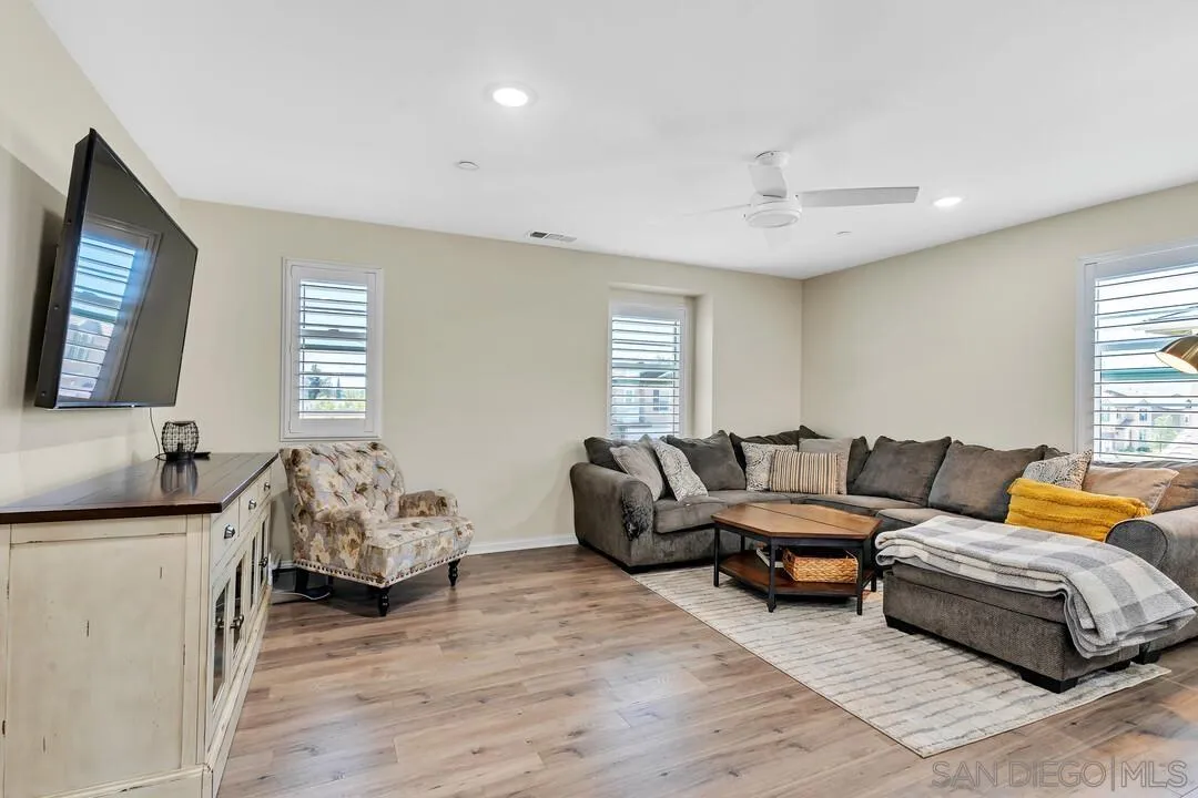 10700 Spring Creek Drive Santee, CA 92071 - Photo 41 of 74 a living room with furniture and a window
