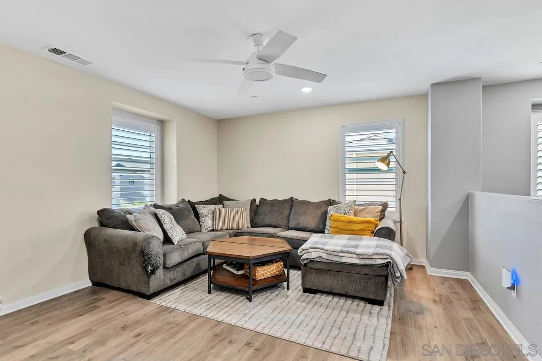 10700 Spring Creek Drive Santee, CA 92071 - Photo 42 of 74 a living room with furniture and a couch