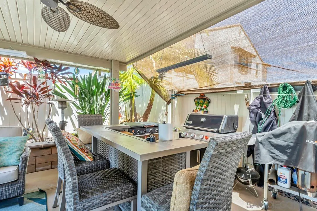 10700 Spring Creek Drive Santee, CA 92071 - Photo 58 of 74 a living room with furniture and a potted plant