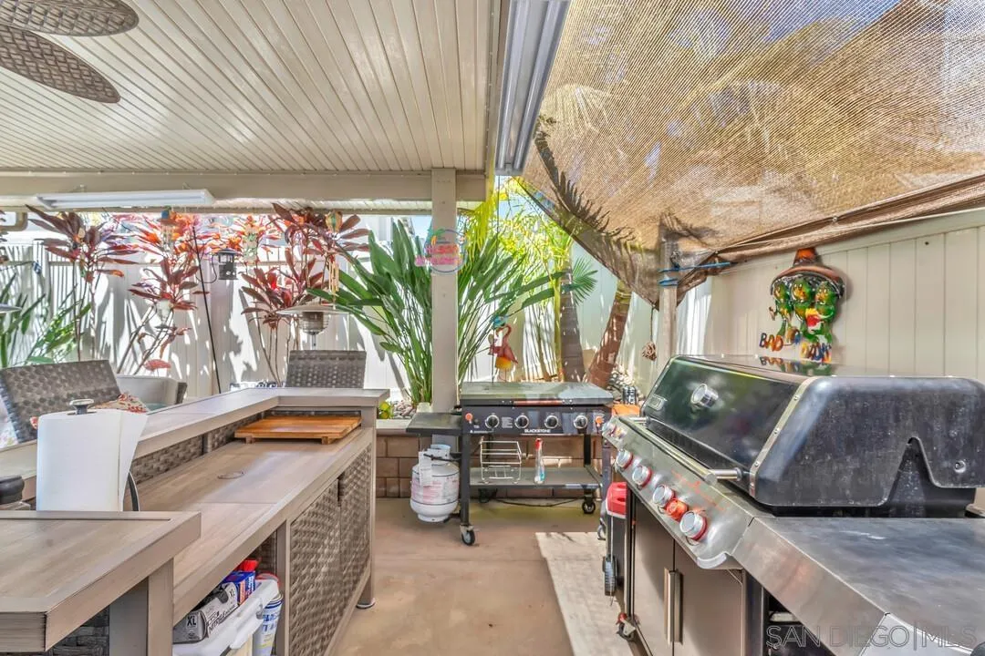 10700 Spring Creek Drive Santee, CA 92071 - Photo 59 of 74 a living room with furniture and a potted plant