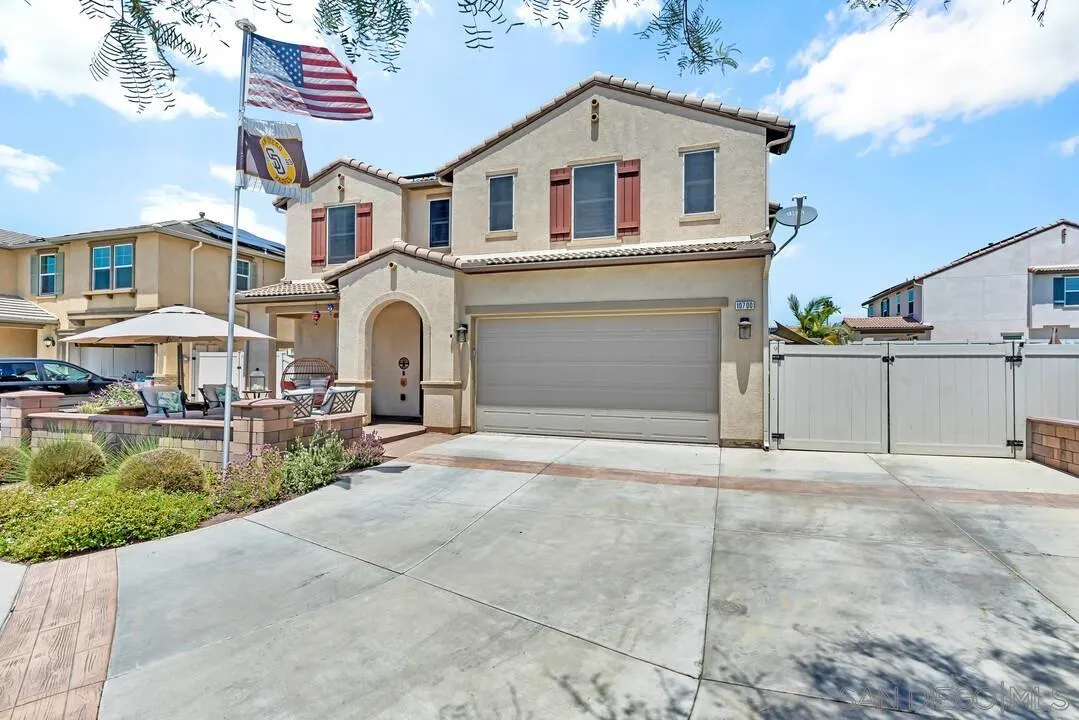 10700 Spring Creek Drive Santee, CA 92071 - Photo 6 of 74 a front view of a house with yard