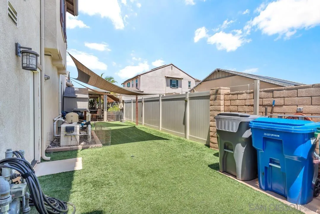 10700 Spring Creek Drive Santee, CA 92071 - Photo 63 of 74 a view of a house with a yard porch and furniture