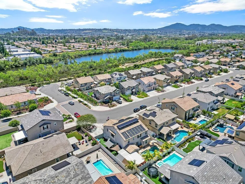 10700 Spring Creek Drive Santee, CA 92071 - Photo 74 of 74 an aerial view of residential houses with outdoor space