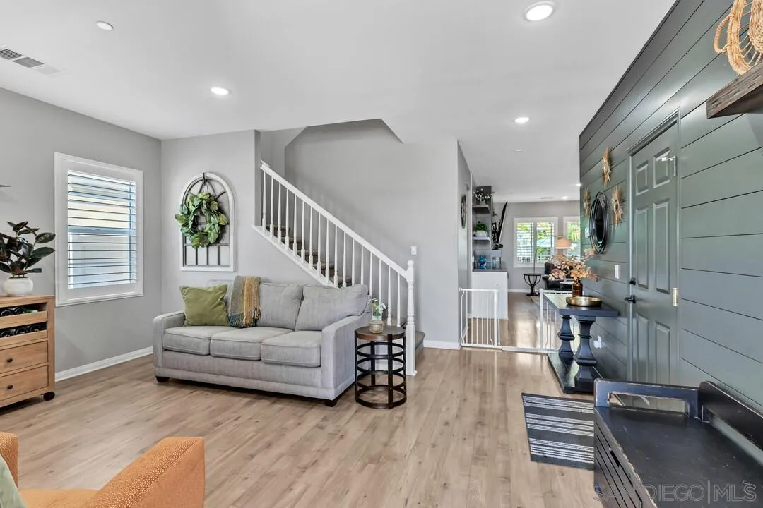 10700 Spring Creek Drive Santee, CA 92071 - Photo 10 of 74 a living room with furniture and wooden floor