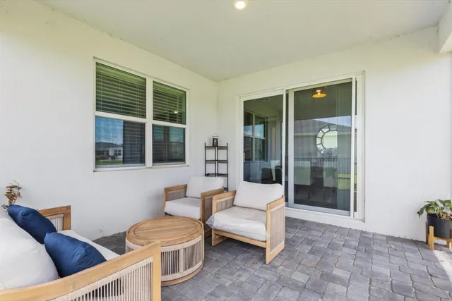 a living room with furniture and a window