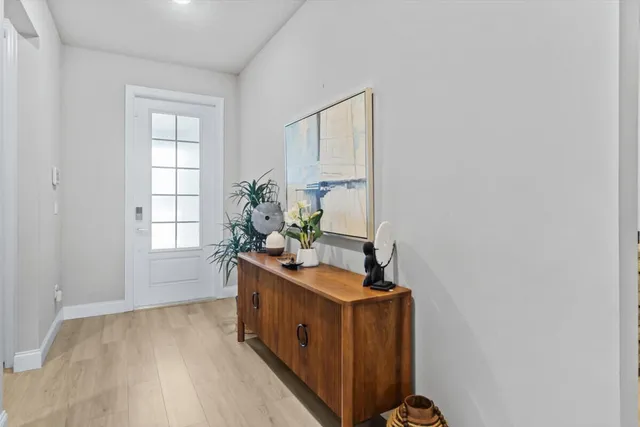 a room with cabinets and wooden floor