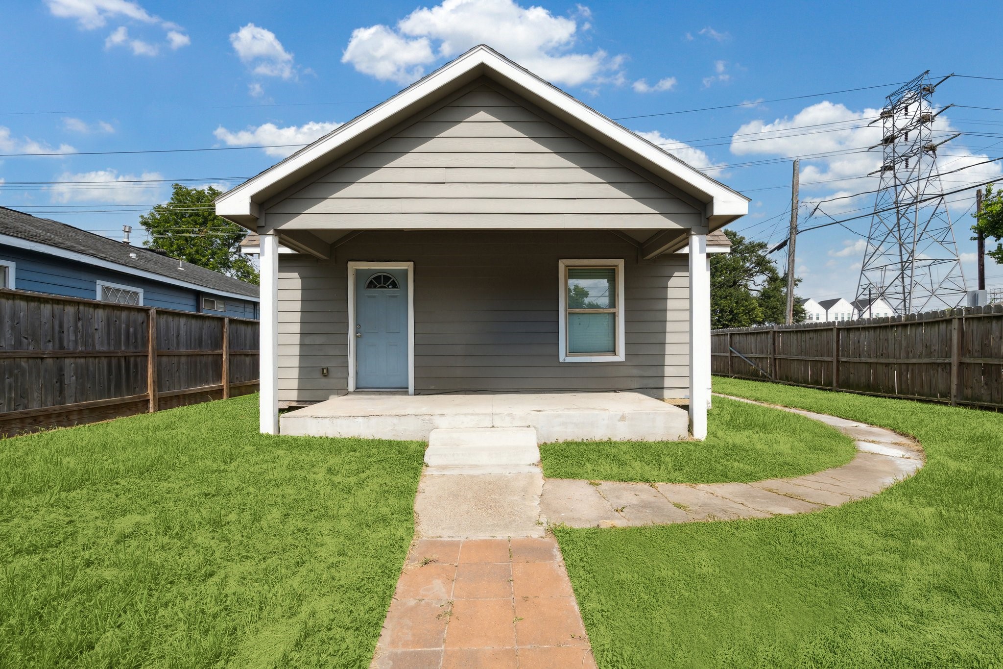 2802 Hardy Street, Unit C Houston, TX 77009 - Photo 1 of 18 a front view of a house with yard