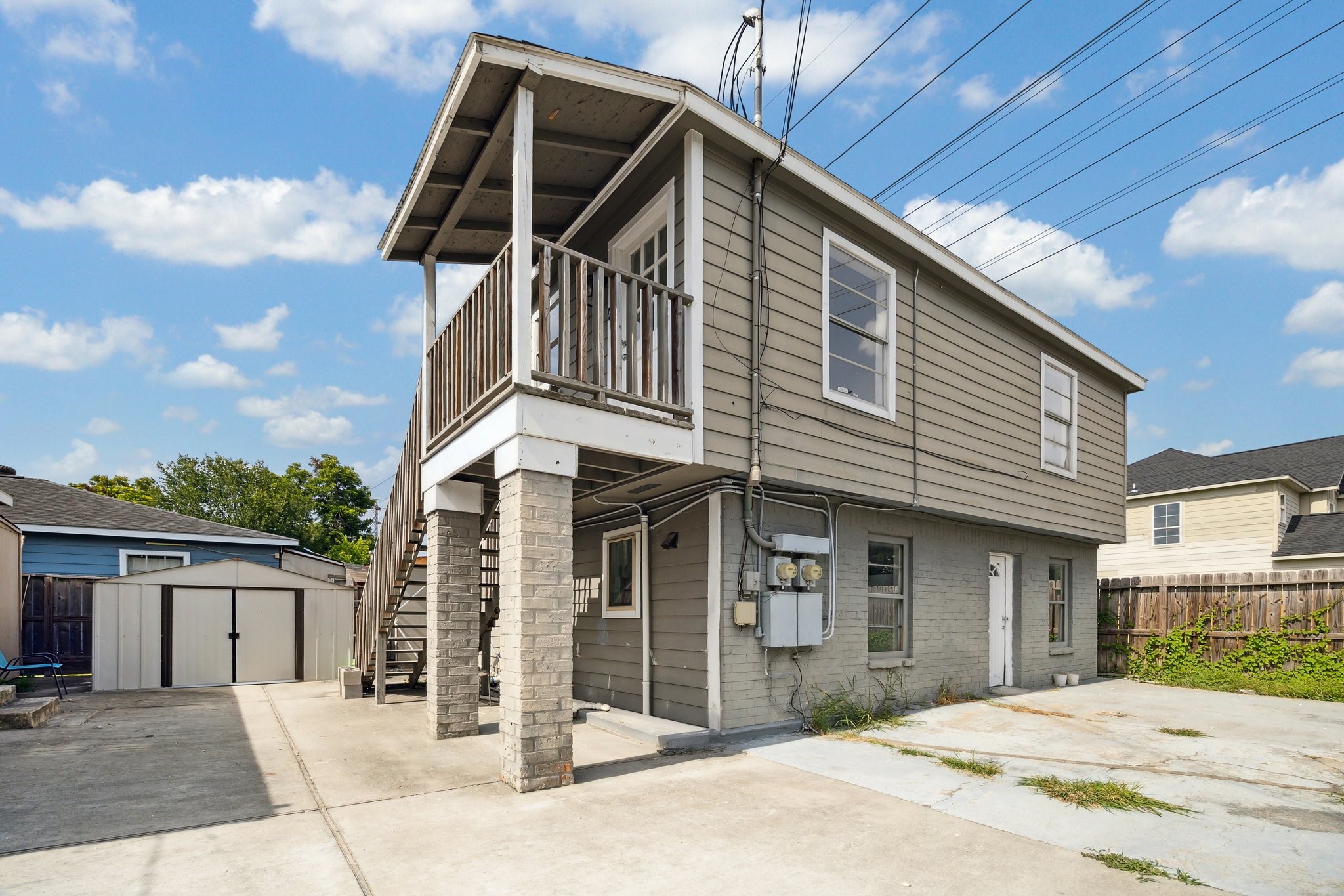 2802 Hardy Street, Unit C Houston, TX 77009 - Photo 18 of 18 a front view of a house with a garage