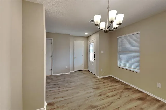 a view of a chandelier in a room