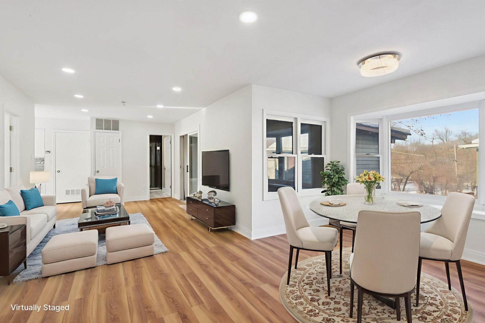 26814 North Genesee Street Wauconda, IL 60084 - Photo 3 of 34 a view of a dining room with furniture window and wooden floor