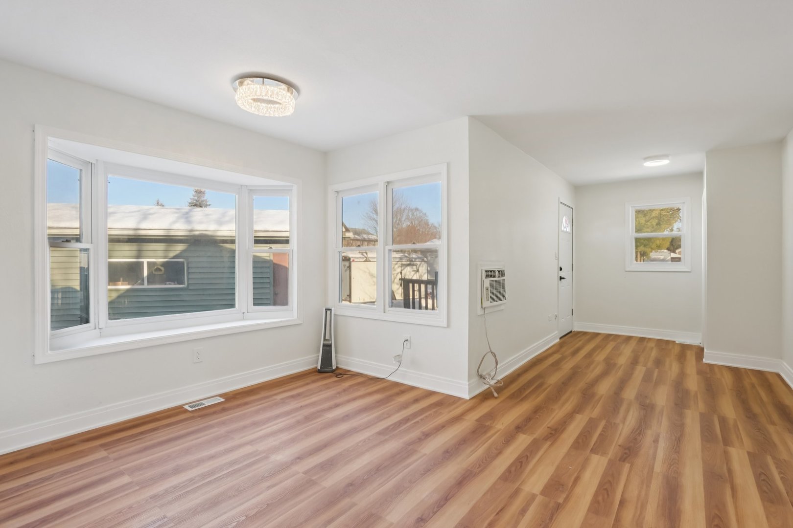 26814 North Genesee Street Wauconda, IL 60084 - Photo 7 of 34 a view of empty room with wooden floor and fan