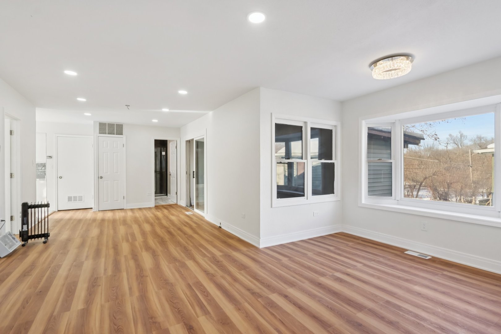 26814 North Genesee Street Wauconda, IL 60084 - Photo 8 of 34 a view of empty room with wooden floor and fan